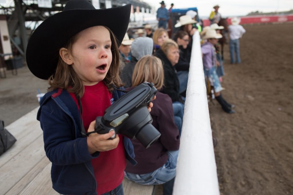 Hawkeye shooting at the Cody Night Rodeo ©Aaron Huey 