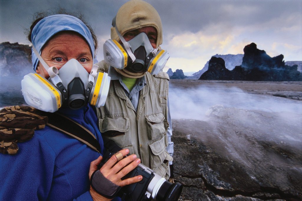 Frans Lanting and Christine Eckstrom at edge of volcano, Hawaii