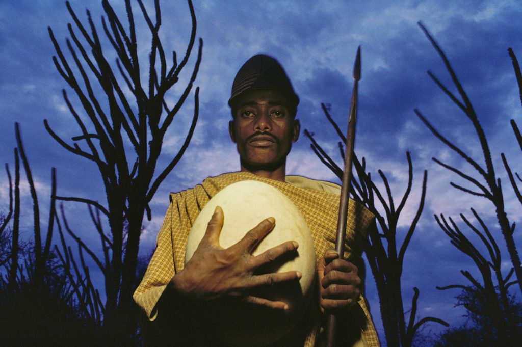 Man with Elephant Bird Egg, Madagascar, 1985