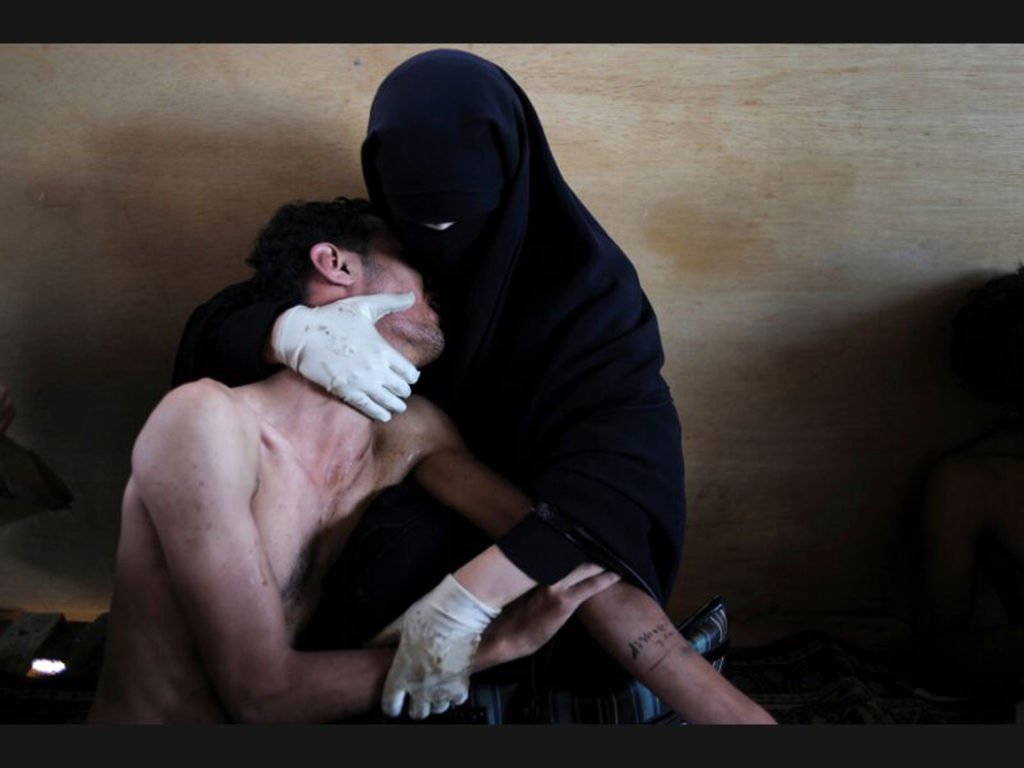 SAMUEL ARANDA, La Pietà islamica, 2011, photo New York Times