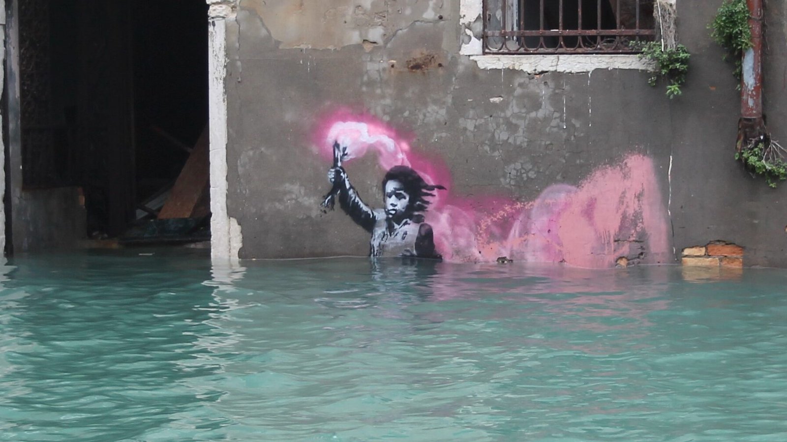 migrant child bansky